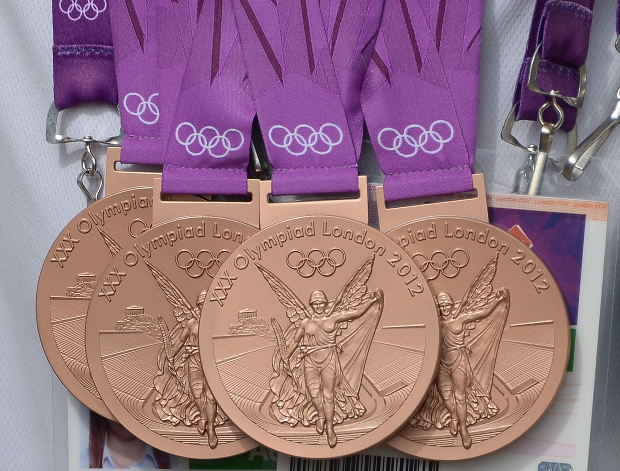 Ои 2026 медали. Олимпийские медали. Ои 2026 медали. Олимпийская медаль 2024 париж. Золотая медаль париж 2024.