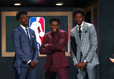 Jrue, Aaronas ir Justinas Holiday