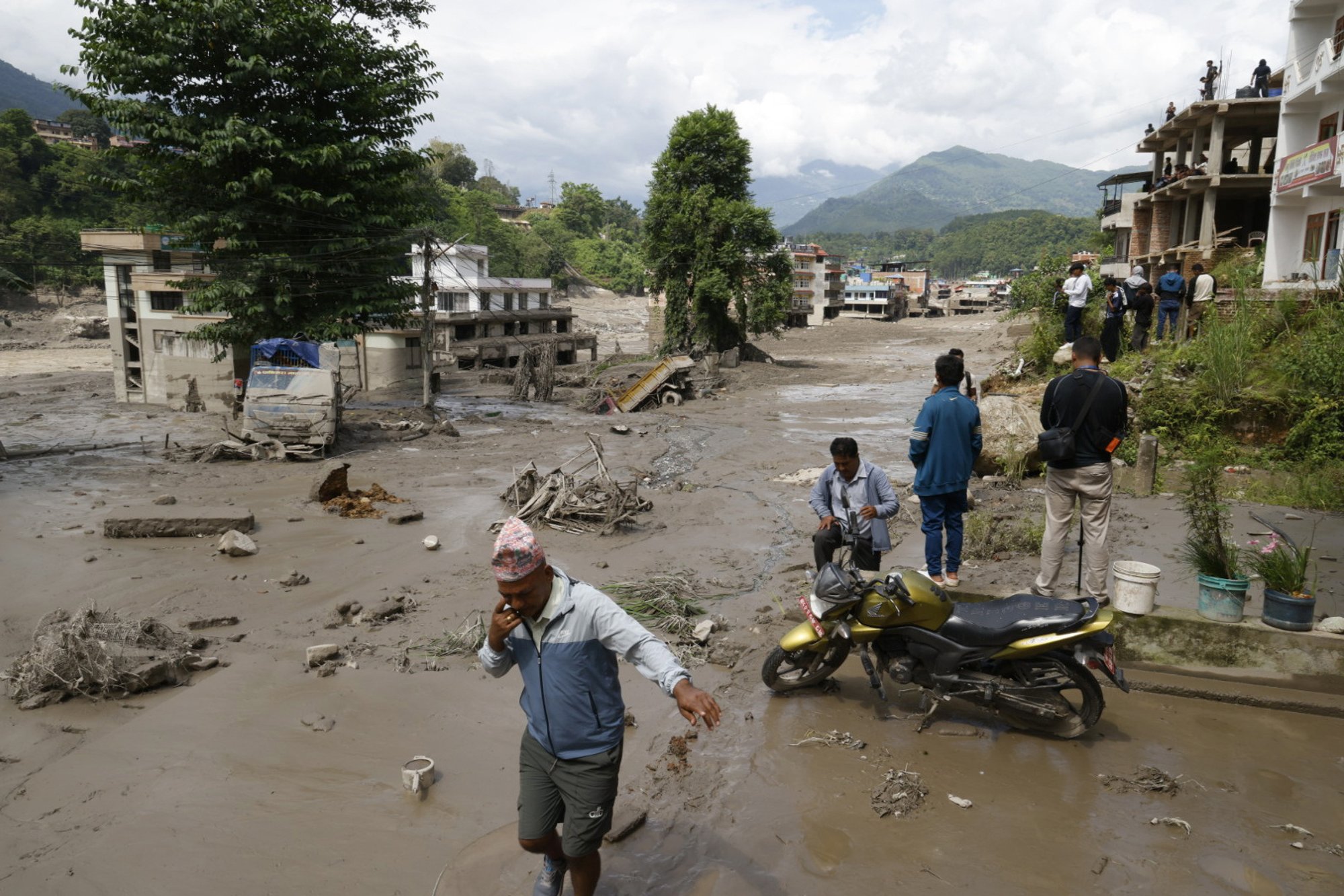 Sudden flood and landslide in Nepal kill at least 17 people