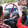 JAV per gegužės 1-osios demonstracijas vyko protestai prieš Trumpą