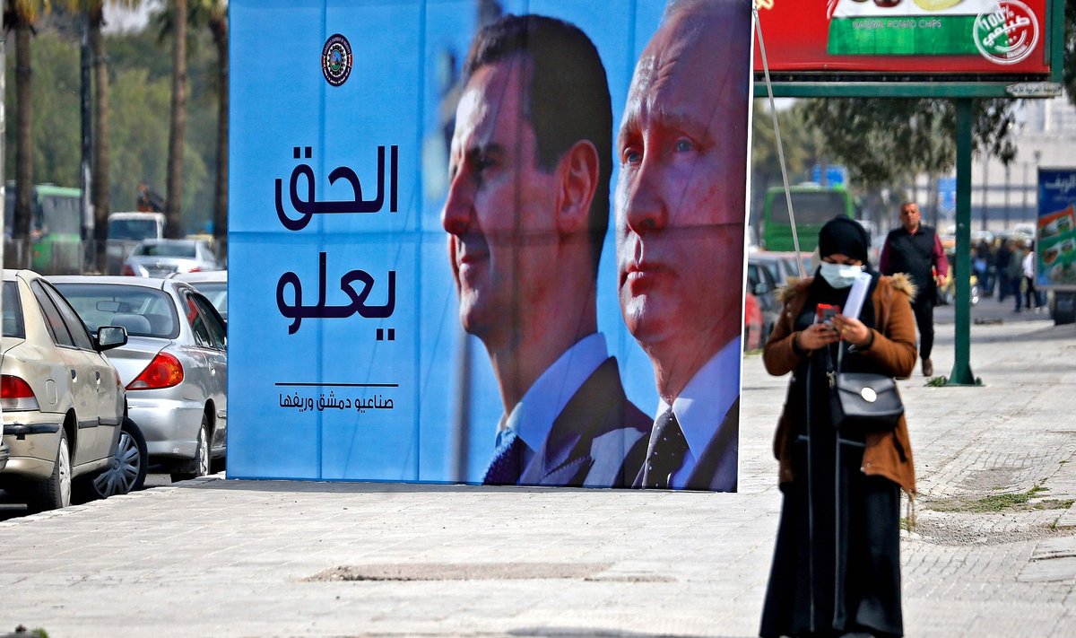 2022 metais Damaske iškeltas plakatas su Sirijos prezidento Basharo al Assado ir Rusijos prezidento Vladimiro Putino atvaizdu bei užrašu „Teisingumas nugali“