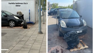 Nustebino neįprastas vaizdas: variklį užsienietis keitė prekybos centro aikštelėje