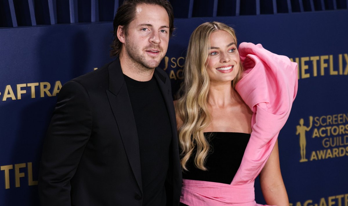 Margot Robbie ir Tomas Ackerley