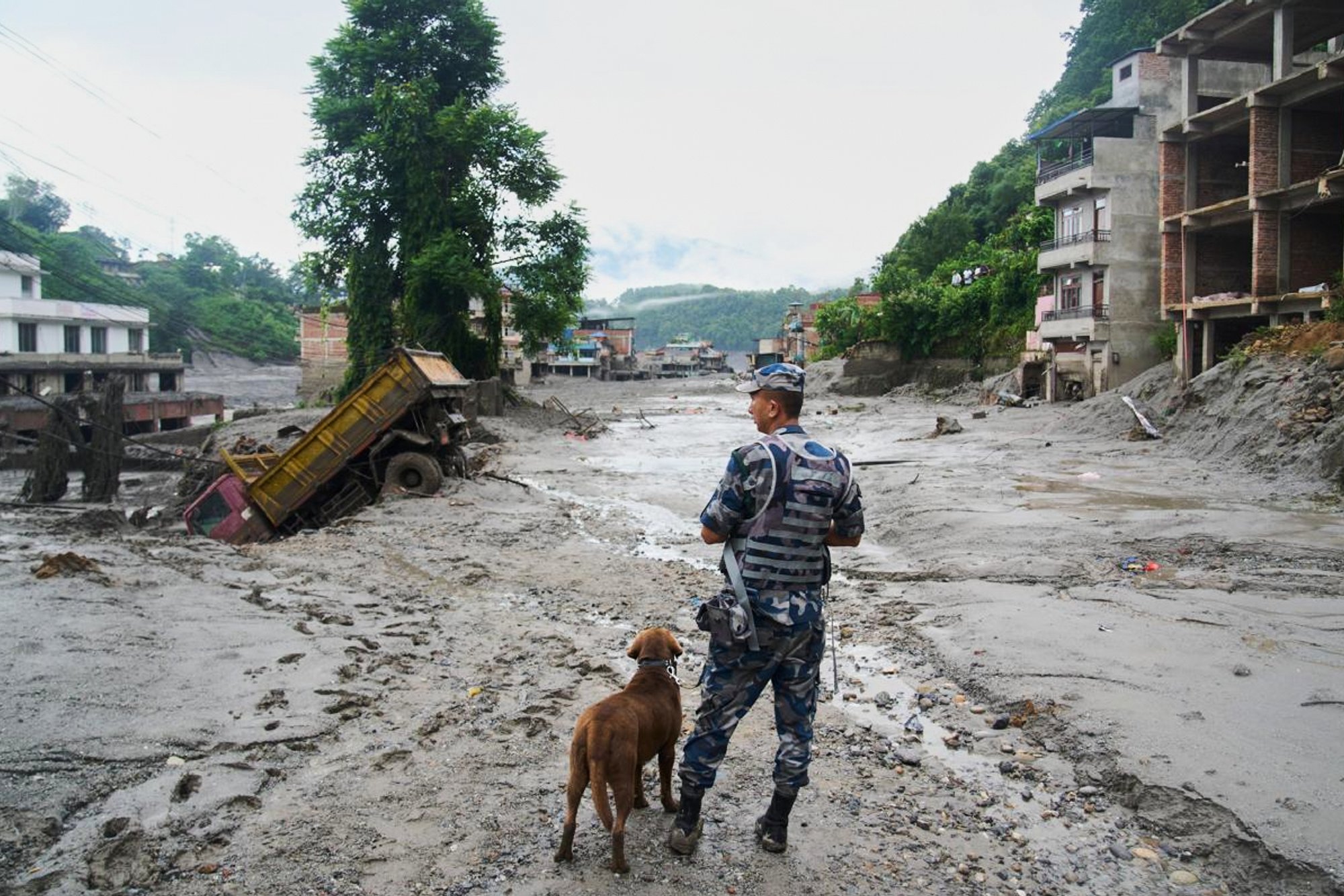 Devastating floods and landslides in Nepal kill at least 180, hundreds missing