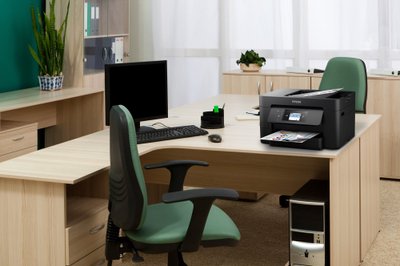 computer on a desk in a modern office