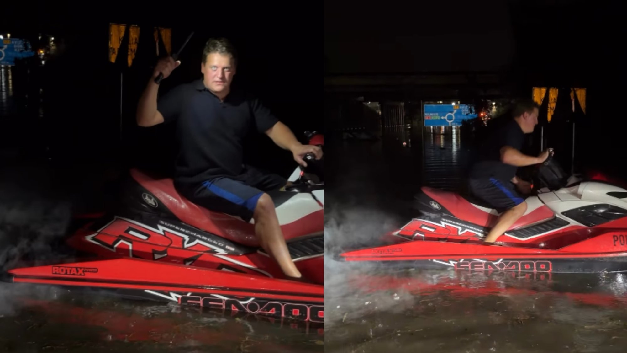 Man rides watercraft down flooded Lithuanian street