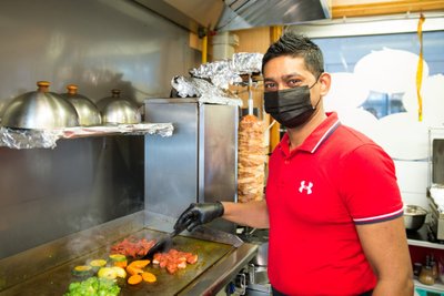 Bengališko ir indiško maisto užkandinės savininkas