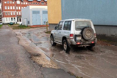 Užlietas įvažiavimas į kiemą