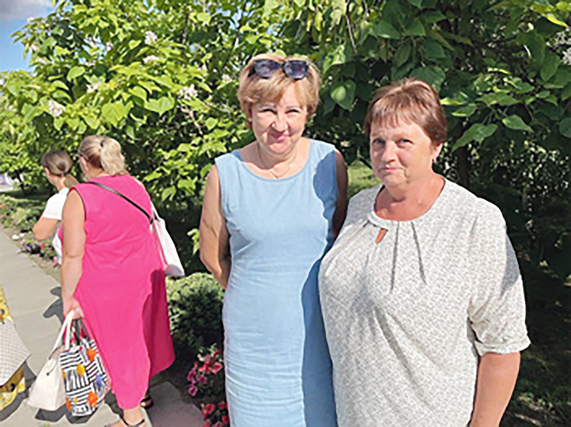 Aliona Lomakina and Svetlana Ivanova, employees of the Elders Administration, confirm that the village's name deceives many tourists, who think that Lithuanians live here (Photo by Eldorado Butrim)