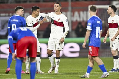 Cristiano Ronaldo ir Joao Cancelo