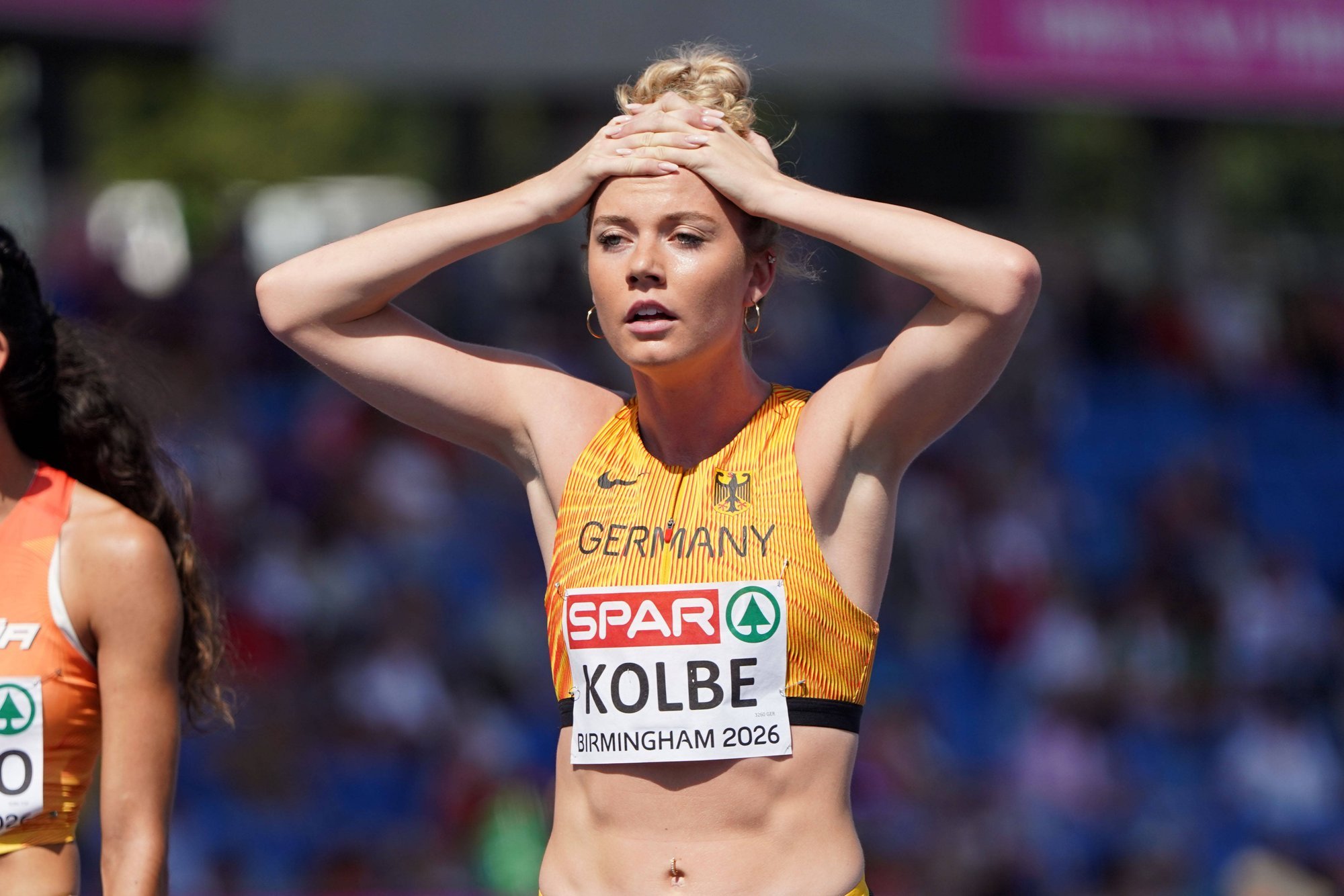 German athlete decries racist abuse, calls for more respect