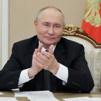 Žiniasklaida: Putinas Trumpą pasveikino slapta