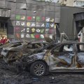 Karas Ukrainoje. „Shahedų“ antskrydžio Kyjive padariniai: išdužę namų langai, apdegę automobiliai