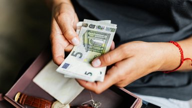 Įtampa dėl JAV muitų ir planuojamos mokesčių pertvarkos kyla: Finansų ministerija teigia vertinusi jos poveikį ekonomikai „normaliais“ laikais