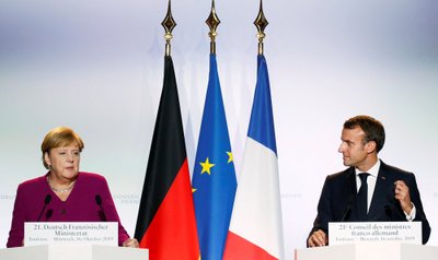 A. Merkel ir E. Macron