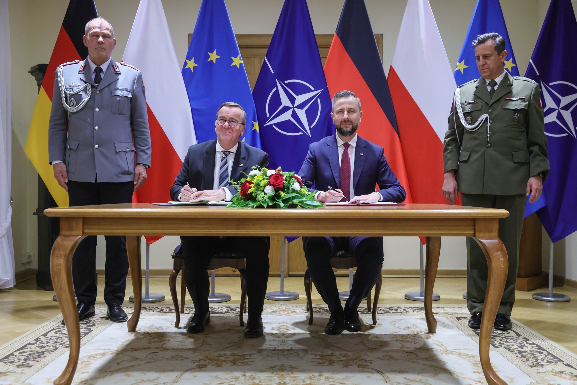 Germany and Poland sign defense pact