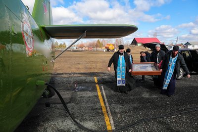 Skrajojantys rusų kunigai meldžia, kad potvyniai liautųsi